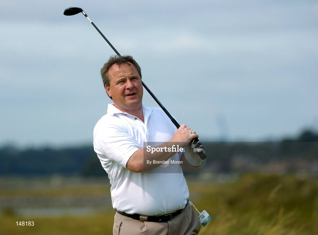 21 July 2004; Dublin football manager Tommy Lyons watches his drive on the 8th tee box. Nissan Irish Open Pro Am, County Louth Golf Club, Baltray, Co. Louth. Picture credit; Brendan Moran / SPORTSFILE