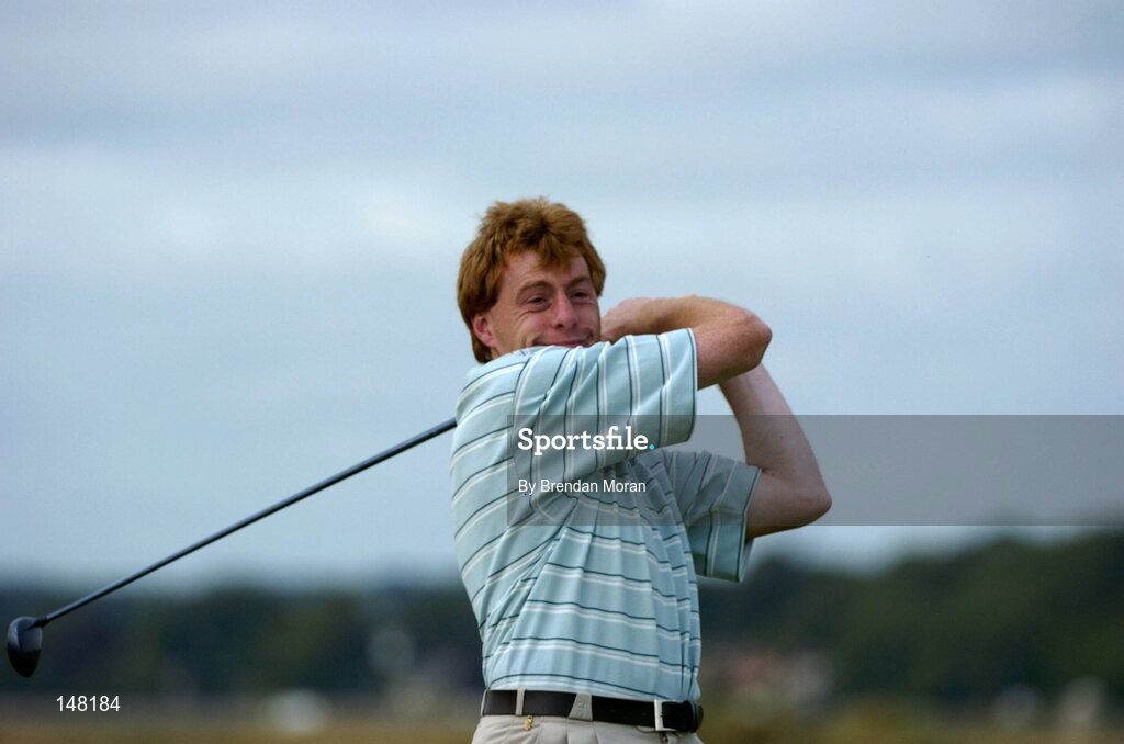 21 July 2004; Vince Casey watches his drive on the 8th tee box. Nissan Irish Open Pro Am, County Louth Golf Club, Baltray, Co. Louth. Picture credit; Brendan Moran / SPORTSFILE