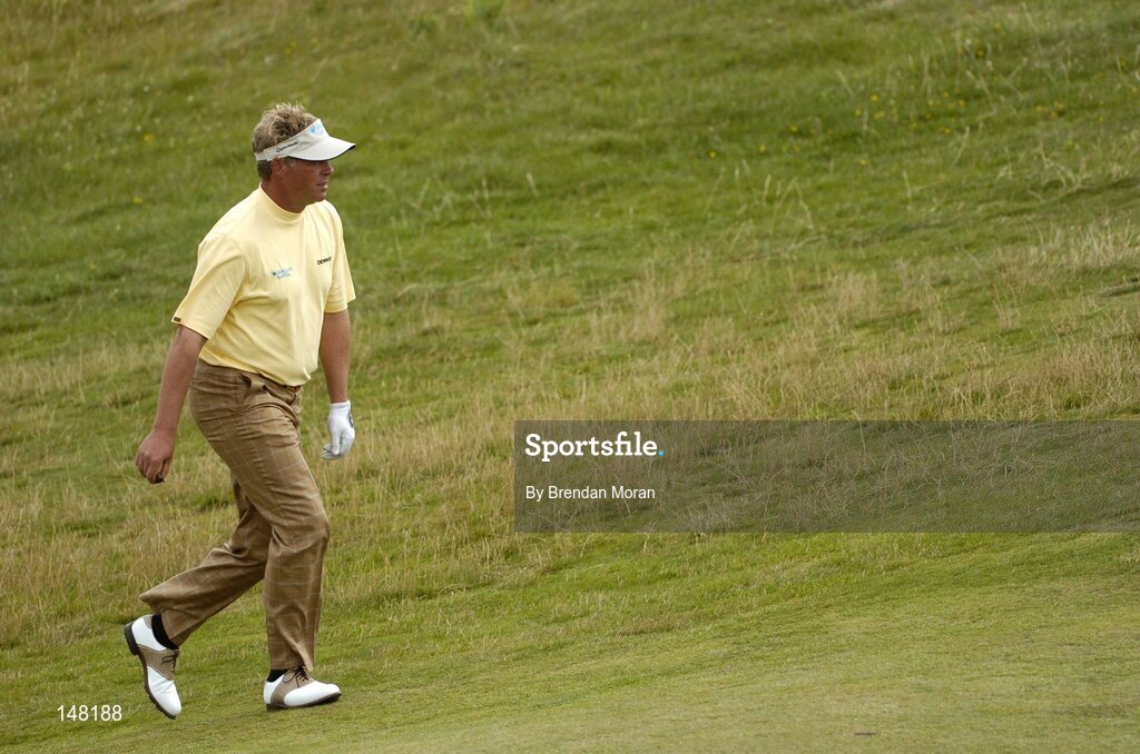 21 July 2004; Darren Clarke makes his way up the 5th fairway. Nissan Irish Open Pro Am, County Louth Golf Club, Baltray, Co. Louth. Picture credit; Brendan Moran / SPORTSFILE