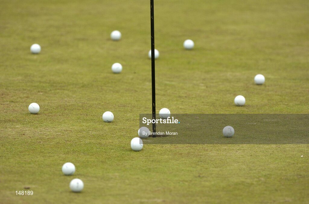 21 July 2004; A general view of golf balls near the hole. Nissan Irish Open Pro Am, County Louth Golf Club, Baltray, Co. Louth. Picture credit; Brendan Moran / SPORTSFILE