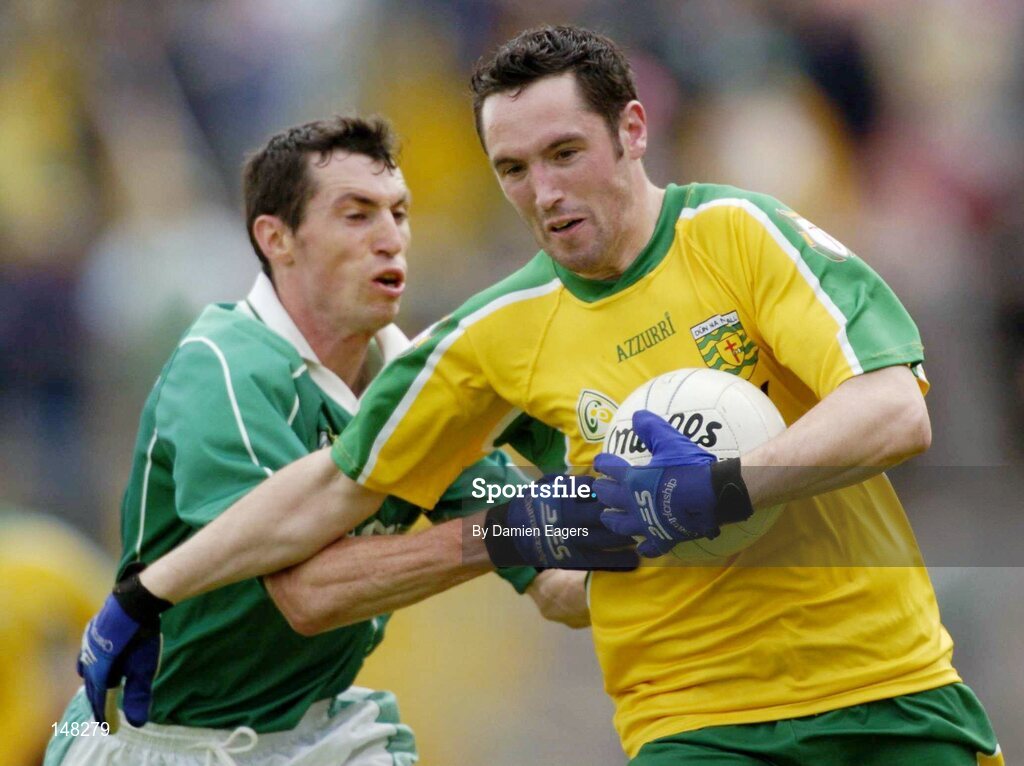 24 July 2004; Brendan Devenney, Donegal, in action against Raymond Johnson, Fermanagh. Bank of Ireland Senior Football Championship Qualifier, Round 4, Fermanagh v Donegal, Tighernach's Park, Clones. Co. Monaghan. Picture credit; Damien Eagers / SPORTSFILE