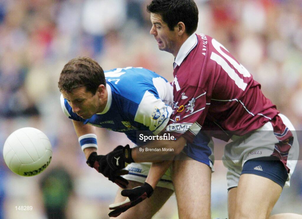 24 July 2004; Kevin Fitzpatrick, Laois, in action against Brian Morley, Westmeath. Bank of Ireland Leinster Senior Football Championship Final Replay, Westmeath v Laois, Croke Park, Dublin. Picture credit; Brendan Moran / SPORTSFILE