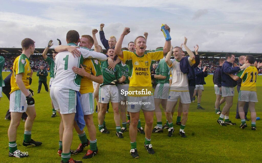 24 July 2004; Fermanagh players including goalkeeper Niall Tiney (1) and captain Shane McDermott, centre, celebrate after victory over Donegal. Bank of Ireland Senior Football Championship Qualifier, Round 4, Fermanagh v Donegal, Tighernach's Park, Clones. Co. Monaghan. Picture credit; Damien Eagers / SPORTSFILE