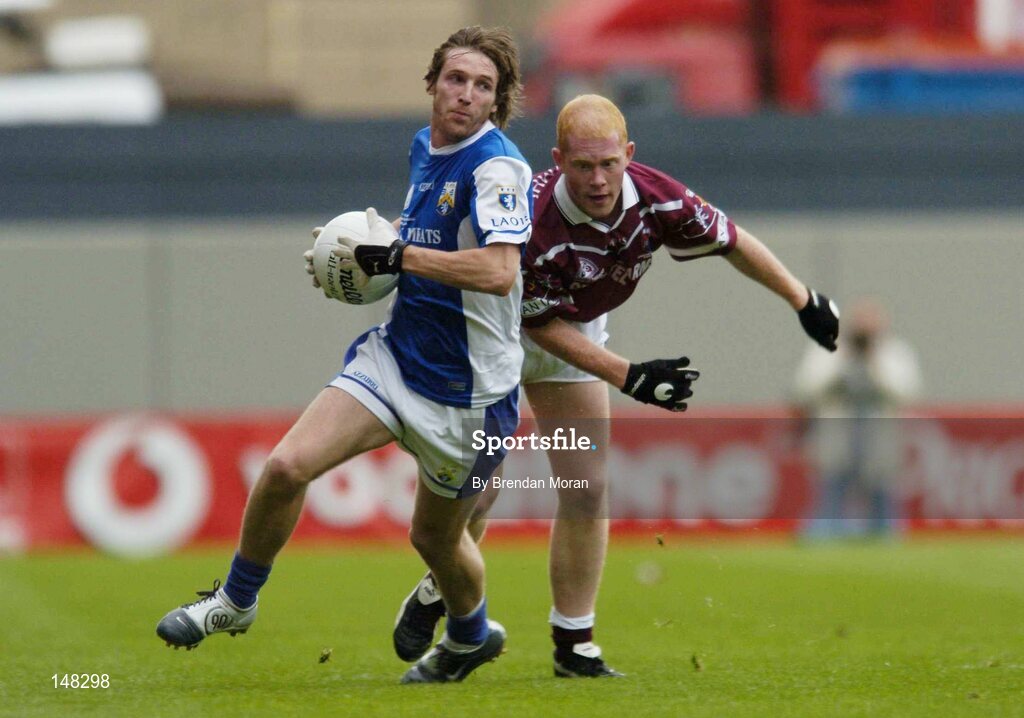 24 July 2004; Colm Parkinson, Laois, in action against Donal O'Donoghue, Westmeath. Bank of Ireland Leinster Senior Football Championship Final Replay, Westmeath v Laois, Croke Park, Dublin. Picture credit; Brendan Moran / SPORTSFILE