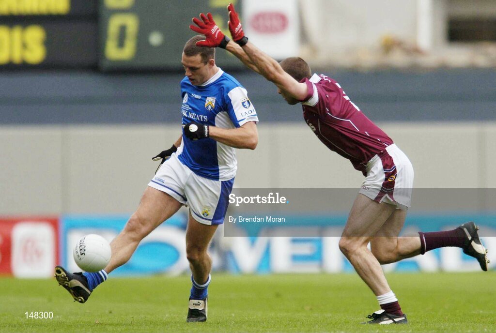 24 July 2004; Darren Rooney, Laois, in action against Paul Conway, Westmeath. Bank of Ireland Leinster Senior Football Championship Final Replay, Westmeath v Laois, Croke Park, Dublin. Picture credit; Brendan Moran / SPORTSFILE