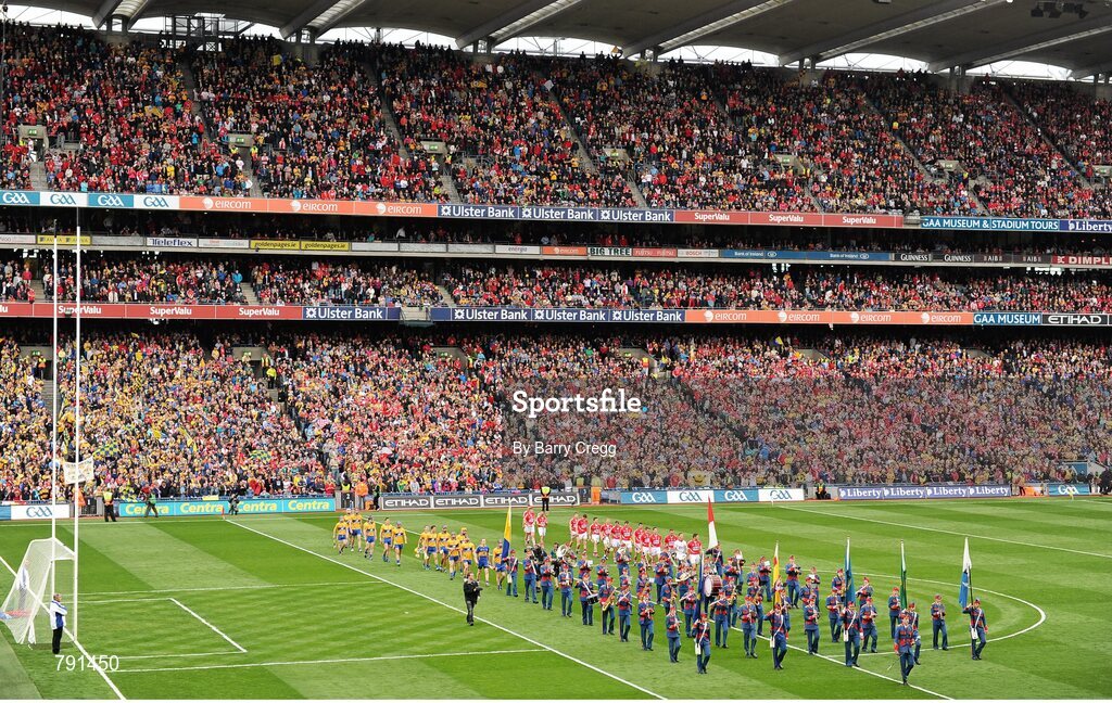 8 September 2013; A general view of the teams walking behind the Artane School of Music Band during the parade before the game. GAA Hurling All-Ireland Senior Championship Final, Cork v Clare, Croke Park, Dublin. Picture credit: Barry Cregg / SPORTSFILE