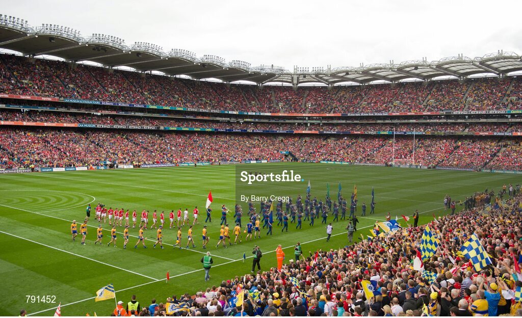 8 September 2013; A general view of the teams walking behind the Artane School of Music Band during the parade before the game. GAA Hurling All-Ireland Senior Championship Final, Cork v Clare, Croke Park, Dublin. Picture credit: Barry Cregg / SPORTSFILE