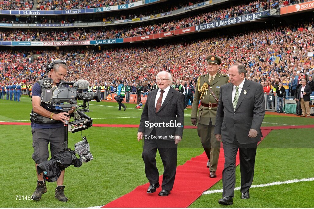 8 September 2013; President of Ireland Michael D. Higgins, accompanied by Uachtarán Chumann Lúthchleas Gael Liam Ó Néill, walks out to meet the teams before the game. GAA Hurling All-Ireland Senior Championship Final, Cork v Clare, Croke Park, Dublin. Picture credit: Brendan Moran / SPORTSFILE