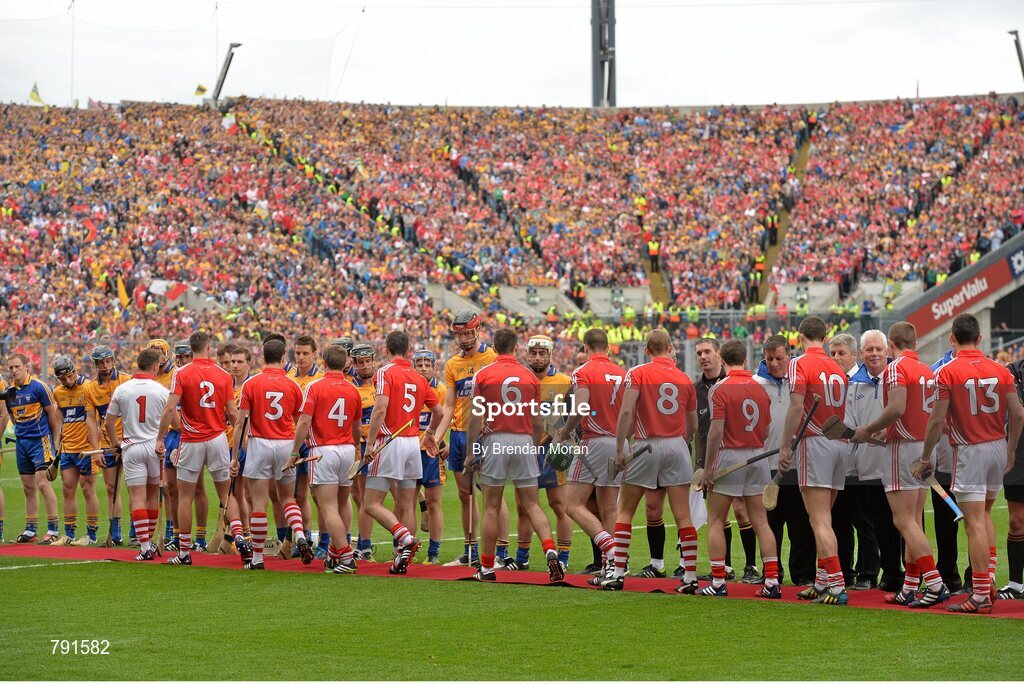 8 September 2013; The teams and match officials shake hands, as part of the GAA Respect initiative, before the game. GAA Hurling All-Ireland Senior Championship Final, Cork v Clare, Croke Park, Dublin. Picture credit: Brendan Moran / SPORTSFILE