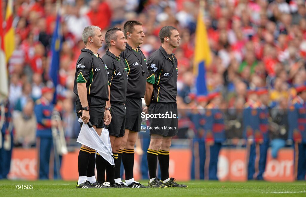 8 September 2013; Referee Brian gavin, 3rd from left, and his match officials Johnny Ryan, James McGrath and James Owens, stand for a minute's silence before the game. GAA Hurling All-Ireland Senior Championship Final, Cork v Clare, Croke Park, Dublin. Picture credit: Brendan Moran / SPORTSFILE