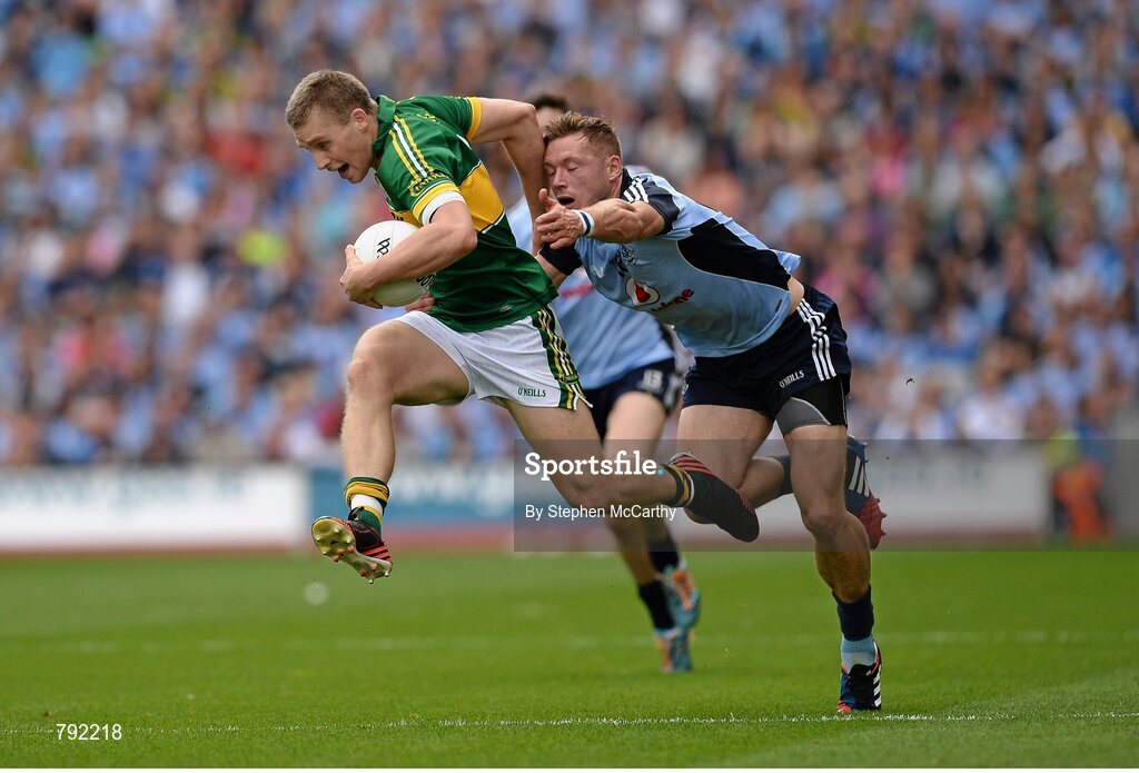1 September 2013; Peter Crowley, Kerry, is tackled by Paul Flynn, Dublin. GAA Football All-Ireland Senior Championship, Semi-Final, Dublin v Kerry, Croke Park, Dublin. Picture credit: Stephen McCarthy / SPORTSFILE