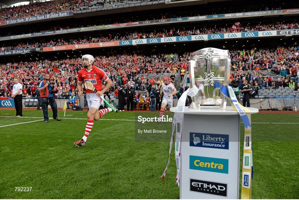 8 September 2013; Cork captain Patrick Cronin makes his way onto the pitch past the Liam MacCarthy Cup. GAA Hurling All-Ireland Senior Championship Final, Cork v Clare, Croke Park, Dublin. Picture credit: Matt Browne / SPORTSFILE