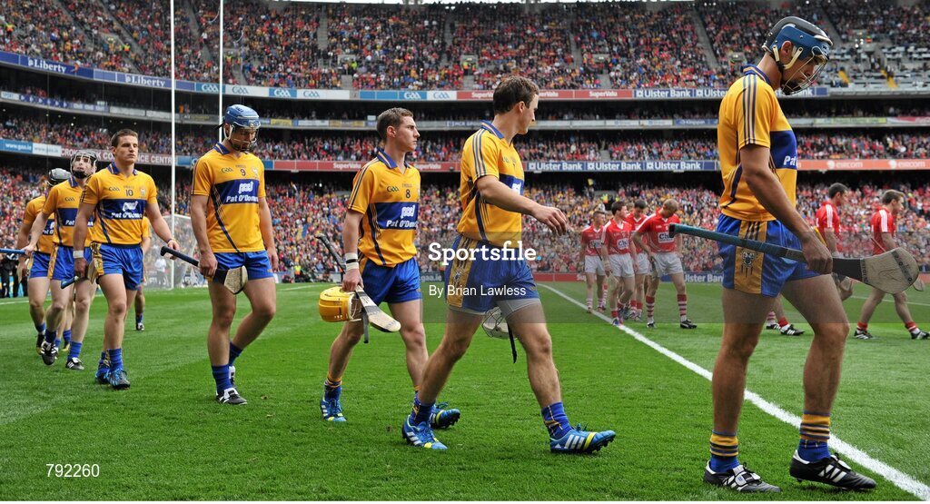8 September 2013; The Clare and Cork teams during the pre-match parade. GAA Hurling All-Ireland Senior Championship Final, Cork v Clare, Croke Park, Dublin. Picture credit: Brian Lawless / SPORTSFILE