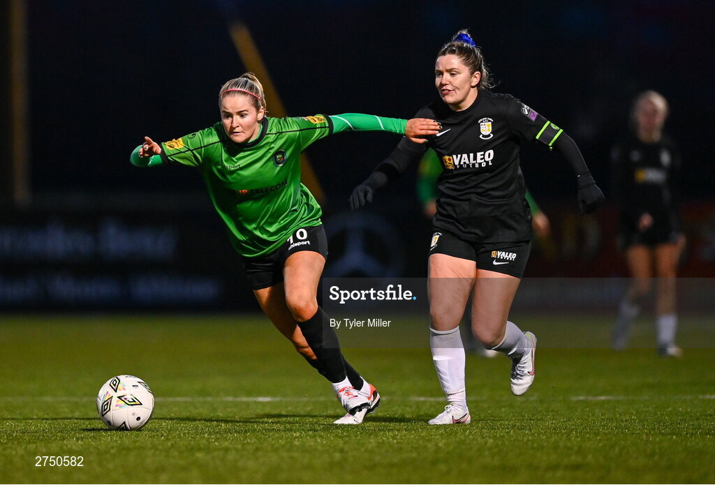 2 March 2024; Erin McLaughlin of Peamount United in action against Laurie Ryan of Athlone Town during the 2024 Women's President's Cup match between Athlone Town and Peamount United at Athlone Town Stadium in Athlone, Westmeath. Photo by Tyler Miller/Sportsfile