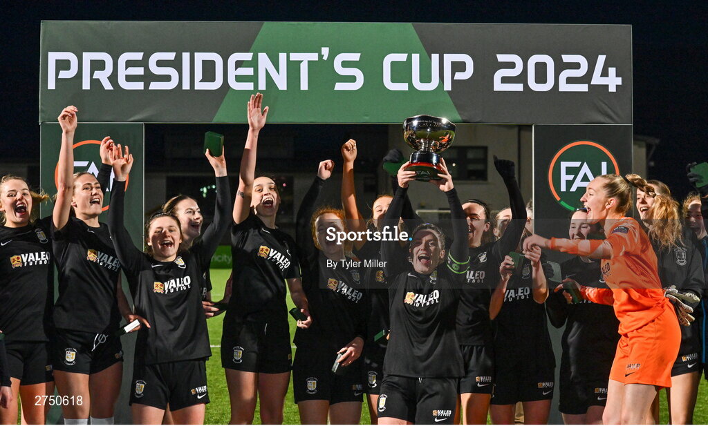 2 March 2024; The Athlone Town squad celebrate with the President's Cup after the 2024 Women's President's Cup match between Athlone Town and Peamount United at Athlone Town Stadium in Athlone, Westmeath. Photo by Tyler Miller/Sportsfile