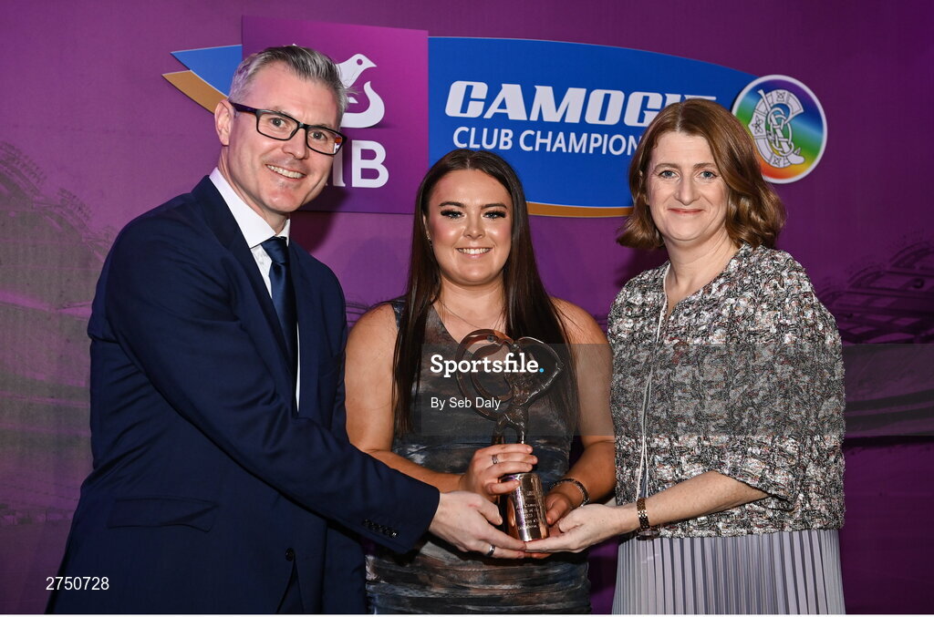 2 March 2024; Amy Clifford of Dicksboro, Kilkenny, centre, is presented with her 2023 Team of the Year award by Uachtarán an Cumann Camógaíochta, Hilda Breslin and Chief Marketing Officer of AIB, Mark Doyle during the AIB Camogie Club Player Awards at Croke Park in Dublin. The awards recognise the top performing players throughout the AIB Camogie Club Championships and celebrate their hard work, commitment, and individual achievements from the 2023 season. Photo by Seb Daly/Sportsfile