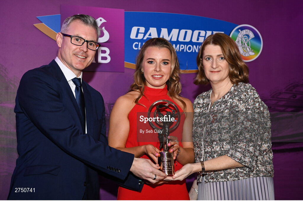 2 March 2024; Sarah Spellman of Sarsfields, Galway, centre, is presented with her 2023 Team of the Year award by Uachtarán an Cumann Camógaíochta, Hilda Breslin and Chief Marketing Officer of AIB, Mark Doyle during the AIB Camogie Club Player Awards at Croke Park in Dublin. The awards recognise the top performing players throughout the AIB Camogie Club Championships and celebrate their hard work, commitment, and individual achievements from the 2023 season. Photo by Seb Daly/Sportsfile