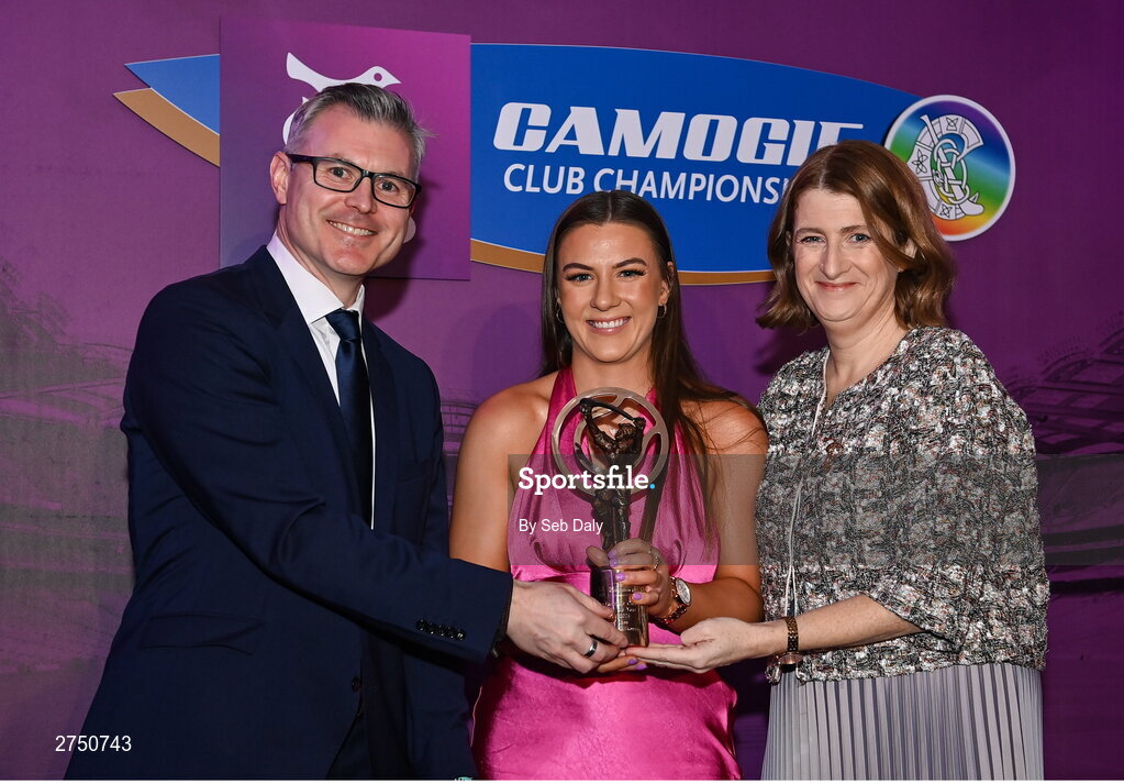 2 March 2024; Jane Cass of Dicksboro, Kilkenny, centre, is presented with her 2023 Team of the Year award by Uachtarán an Cumann Camógaíochta, Hilda Breslin and Chief Marketing Officer of AIB, Mark Doyle during the AIB Camogie Club Player Awards at Croke Park in Dublin. The awards recognise the top performing players throughout the AIB Camogie Club Championships and celebrate their hard work, commitment, and individual achievements from the 2023 season. Photo by Seb Daly/Sportsfile