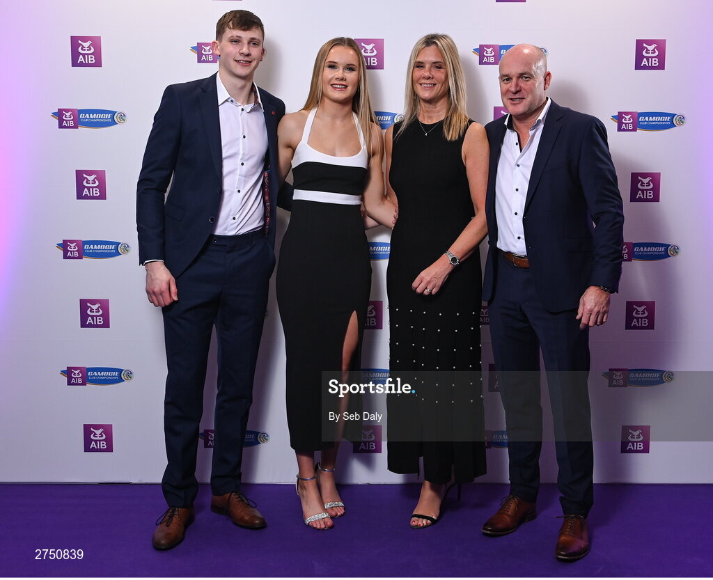 2 March 2024; Asha McHardy of Dicksboro, Kilkenny, second from left, with partner Eoin Deely, left, and Genevieve and Jamie McHardy on arrival at the AIB Camogie Club Player Awards at Croke Park in Dublin. Photo by Seb Daly/Sportsfile