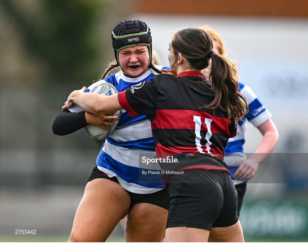6 March 2024; Libby Kehoe of St Mary's New Ross is tackled by Mollie O'Leary of St Mary's Arklow during the Bank of Ireland Leinster Rugby Schools Girls’ Junior final match between St Mary's New Ross and St Mary's Arklow at Energia Park in Dublin. Photo by Piaras Ó Mídheach/Sportsfile