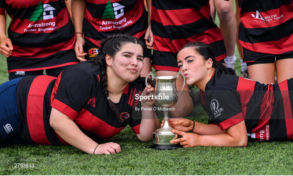 6 March 2024; 6 March 2024; St Mary's Arklow joint-captains Laragh O'Callaghan, left, and Aoibhe Merrigan celebrate with the cup after their side's victory in the Bank of Ireland Leinster Rugby Schools Girls’ Junior final match between St Mary's New Ross and St Mary's Arklow at Energia Park in Dublin. Photo by Piaras Ó Mídheach/Sportsfile