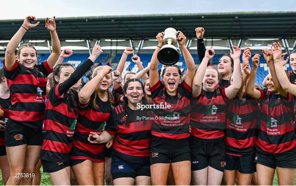 6 March 2024; St Mary's Arklow joint-captain Aoibhe Merrigan holds the cup aloft during the celebrations after her side's victory in the Bank of Ireland Leinster Rugby Schools Girls’ Junior final match between St Mary's New Ross and St Mary's Arklow at Energia Park in Dublin. Photo by Piaras Ó Mídheach/Sportsfile
