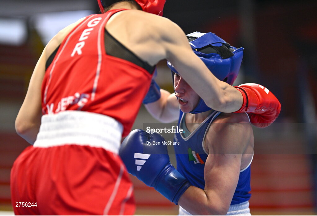 8 March 2024; Grainne Walsh of Ireland, right, in action against Stefanie Von Berge of Germany during their Women's 66kg Round of 32 bout against during day six at the Paris 2024 Olympic Boxing Qualification Tournament at E-Work Arena in Busto Arsizio, Italy. Photo by Ben McShane/Sportsfile