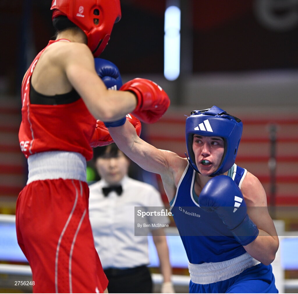 8 March 2024; Grainne Walsh of Ireland, right, in action against Stefanie Von Berge of Germany during their Women's 66kg Round of 32 bout against during day six at the Paris 2024 Olympic Boxing Qualification Tournament at E-Work Arena in Busto Arsizio, Italy. Photo by Ben McShane/Sportsfile