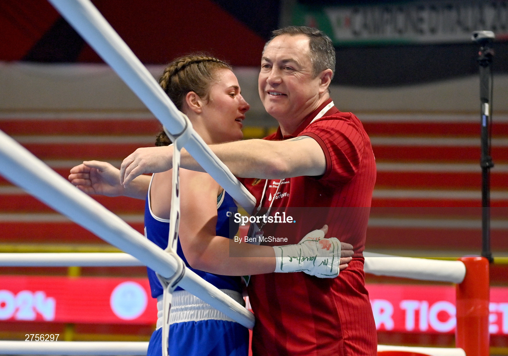 8 March 2024; Grainne Walsh of Ireland, left, is congratulated by Germany coach Eddie Bolger after her victory in the Women's 66kg Round of 32 bout against Stefanie Von Berge of Germany during day six at the Paris 2024 Olympic Boxing Qualification Tournament at E-Work Arena in Busto Arsizio, Italy. Photo by Ben McShane/Sportsfile