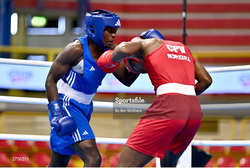 8 March 2024; Ivanusa Moreira of Cabo Verde, right, in action against Emily Tinah Nakalema of Uganda during their Women's 66kg Round of 32 bout during day six at the Paris 2024 Olympic Boxing Qualification Tournament at E-Work Arena in Busto Arsizio, Italy. Photo by Ben McShane/Sportsfile