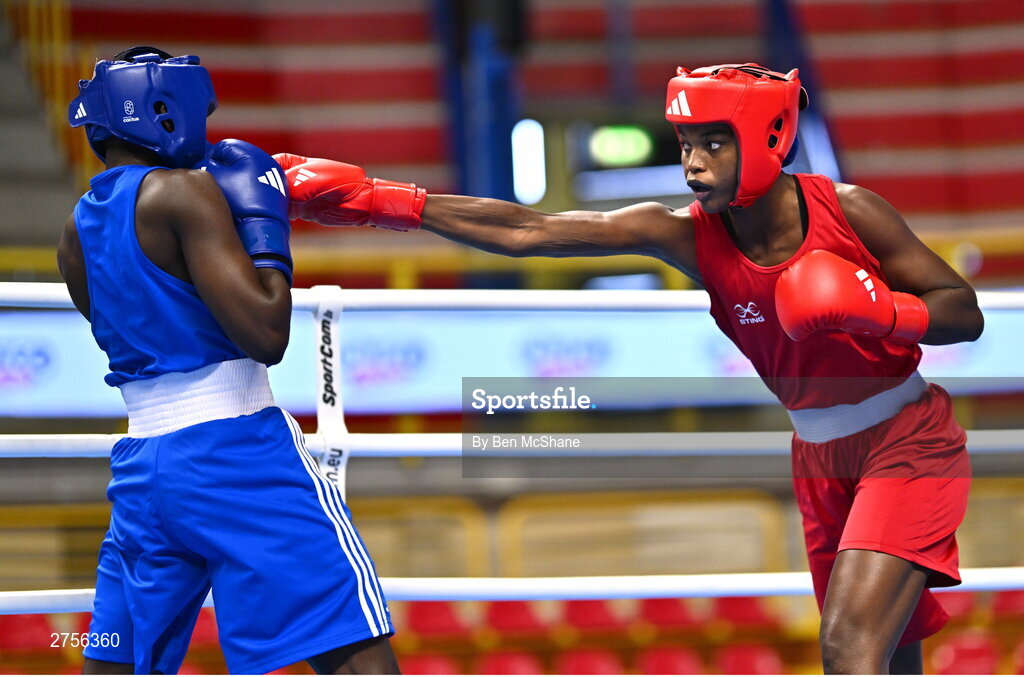 8 March 2024; Ivanusa Moreira of Cabo Verde, right, in action against Emily Tinah Nakalema of Uganda during their Women's 66kg Round of 32 bout during day six at the Paris 2024 Olympic Boxing Qualification Tournament at E-Work Arena in Busto Arsizio, Italy. Photo by Ben McShane/Sportsfile