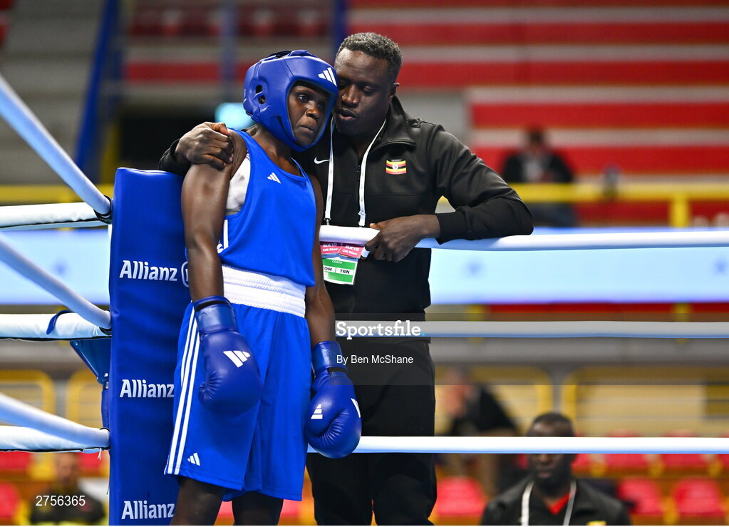 8 March 2024; Emily Tinah Nakalema of Uganda with Uganda coach Twaib Mayanja before their Women's 66kg Round of 32 bout against Ivanusa Moreira of Cabo Verde during day six at the Paris 2024 Olympic Boxing Qualification Tournament at E-Work Arena in Busto Arsizio, Italy. Photo by Ben McShane/Sportsfile