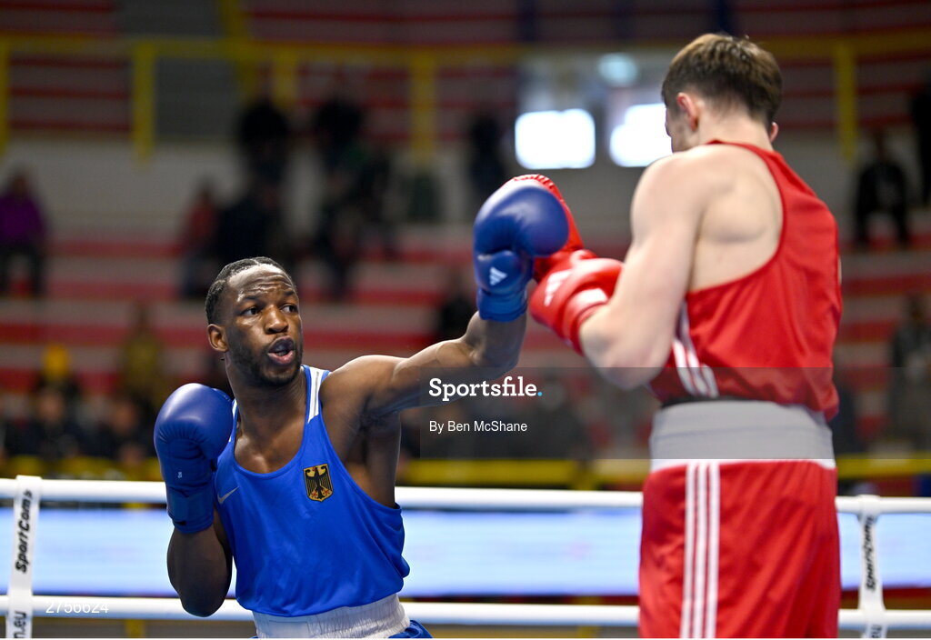 8 March 2024; Aliaksei Alfiorau of Individual Neutral Athletes, right, in action against Kevin Boakye Schumann of Germany during their Men's 80kg Round of 32 bout during day six at the Paris 2024 Olympic Boxing Qualification Tournament at E-Work Arena in Busto Arsizio, Italy. Photo by Ben McShane/Sportsfile
