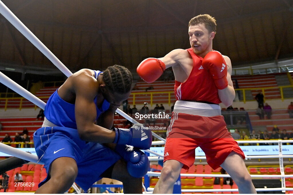 8 March 2024; Aliaksei Alfiorau of Individual Neutral Athletes, right, knocks out Kevin Boakye Schumann of Germany during their Men's 80kg Round of 32 bout during day six at the Paris 2024 Olympic Boxing Qualification Tournament at E-Work Arena in Busto Arsizio, Italy. Photo by Ben McShane/Sportsfile