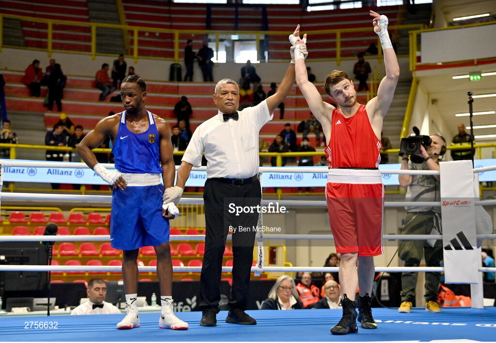 8 March 2024; Aliaksei Alfiorau of Individual Neutral Athletes, is declared victorious over Kevin Boakye Schumann of Germany after their Men's 80kg Round of 32 bout during day six at the Paris 2024 Olympic Boxing Qualification Tournament at E-Work Arena in Busto Arsizio, Italy. Photo by Ben McShane/Sportsfile