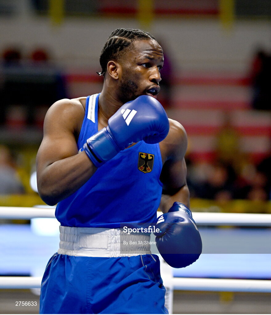 8 March 2024; Kevin Boakye Schumann of Germany during their Men's 80kg Round of 32 bout against Aliaksei Alfiorau of Individual Neutral Athletes during day six at the Paris 2024 Olympic Boxing Qualification Tournament at E-Work Arena in Busto Arsizio, Italy. Photo by Ben McShane/Sportsfile