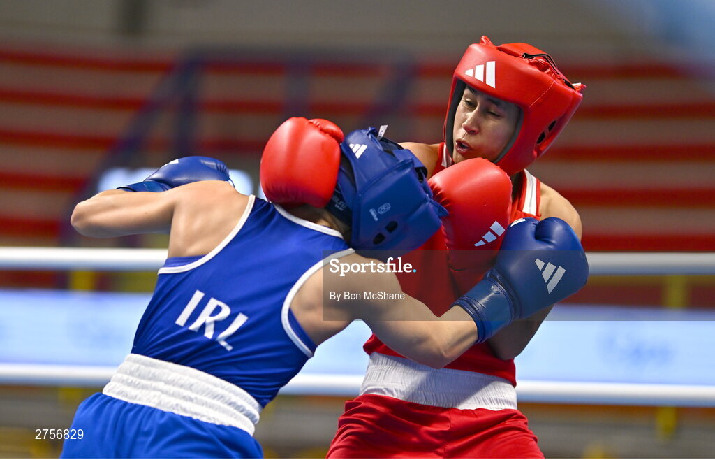 8 March 2024; Tayonis Cedeno of Venezuela, right, in action against Daina Moorehouse of Ireland during their Women's 50kg Round of 32 bout against during day six at the Paris 2024 Olympic Boxing Qualification Tournament at E-Work Arena in Busto Arsizio, Italy. Photo by Ben McShane/Sportsfile