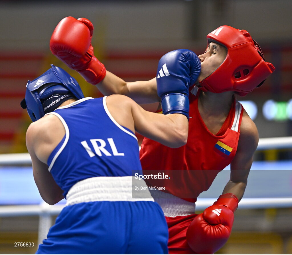 8 March 2024; Daina Moorehouse of Ireland, right, in action against Tayonis Cedeno of Venezuela during their Women's 50kg Round of 32 bout against during day six at the Paris 2024 Olympic Boxing Qualification Tournament at E-Work Arena in Busto Arsizio, Italy. Photo by Ben McShane/Sportsfile