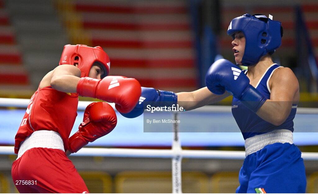 8 March 2024; Daina Moorehouse of Ireland, right, in action against Tayonis Cedeno of Venezuela during their Women's 50kg Round of 32 bout against during day six at the Paris 2024 Olympic Boxing Qualification Tournament at E-Work Arena in Busto Arsizio, Italy. Photo by Ben McShane/Sportsfile