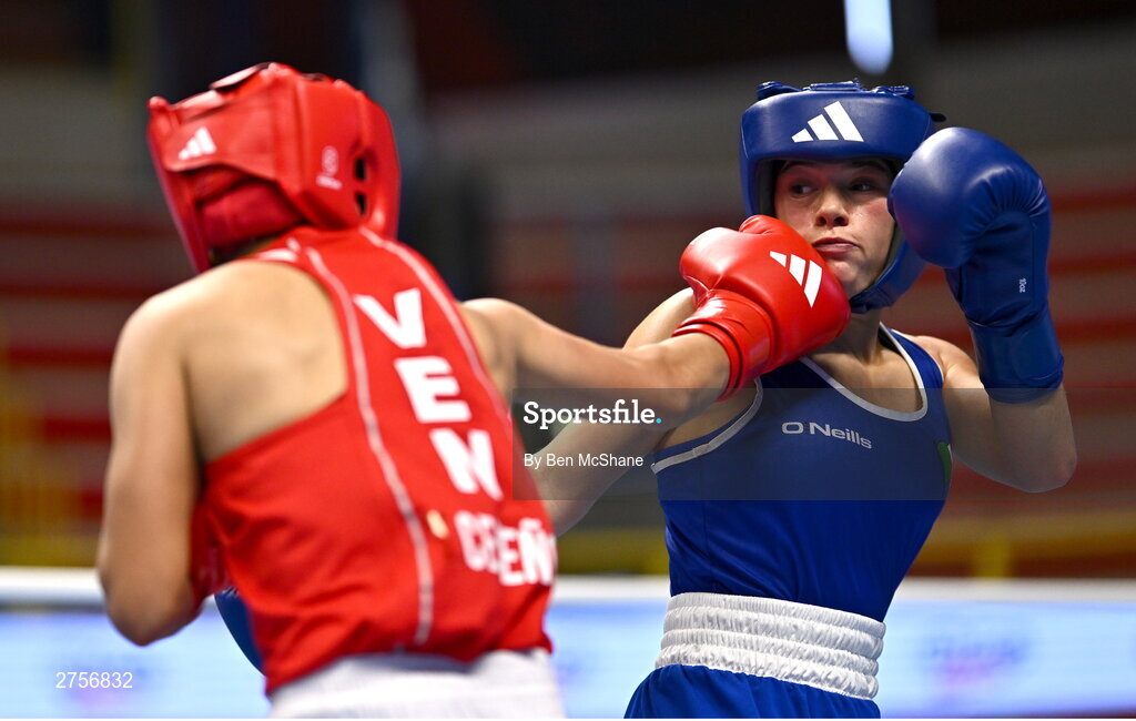 8 March 2024; Daina Moorehouse of Ireland, right, in action against Tayonis Cedeno of Venezuela during their Women's 50kg Round of 32 bout against during day six at the Paris 2024 Olympic Boxing Qualification Tournament at E-Work Arena in Busto Arsizio, Italy. Photo by Ben McShane/Sportsfile
