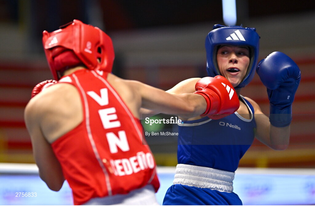 8 March 2024; Daina Moorehouse of Ireland, right, in action against Tayonis Cedeno of Venezuela during their Women's 50kg Round of 32 bout against during day six at the Paris 2024 Olympic Boxing Qualification Tournament at E-Work Arena in Busto Arsizio, Italy. Photo by Ben McShane/Sportsfile