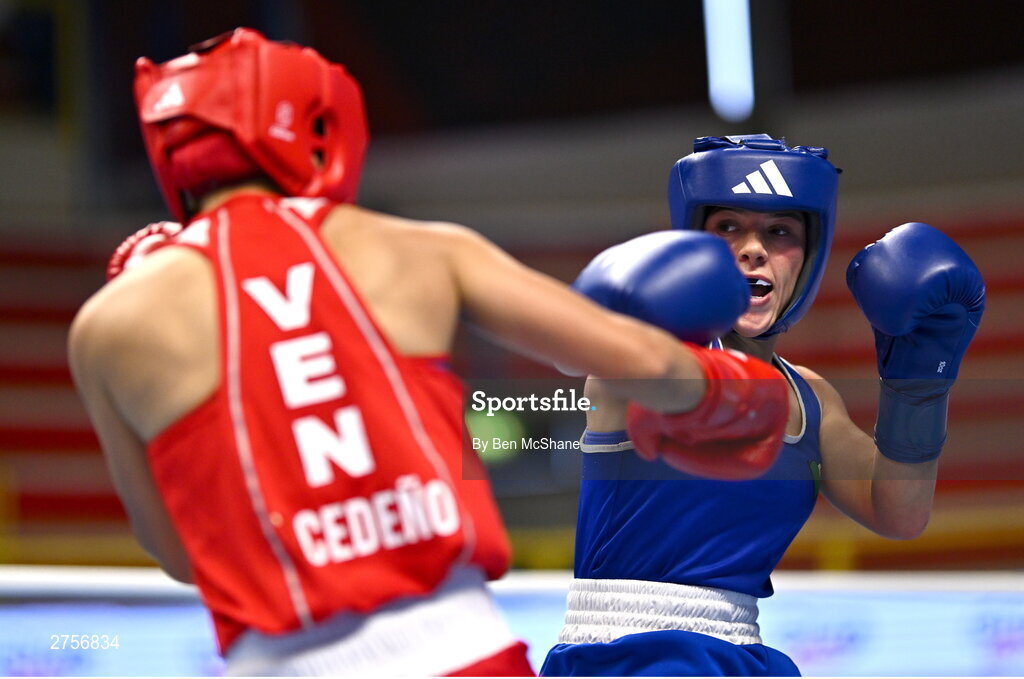 8 March 2024; Daina Moorehouse of Ireland, right, in action against Tayonis Cedeno of Venezuela during their Women's 50kg Round of 32 bout against during day six at the Paris 2024 Olympic Boxing Qualification Tournament at E-Work Arena in Busto Arsizio, Italy. Photo by Ben McShane/Sportsfile