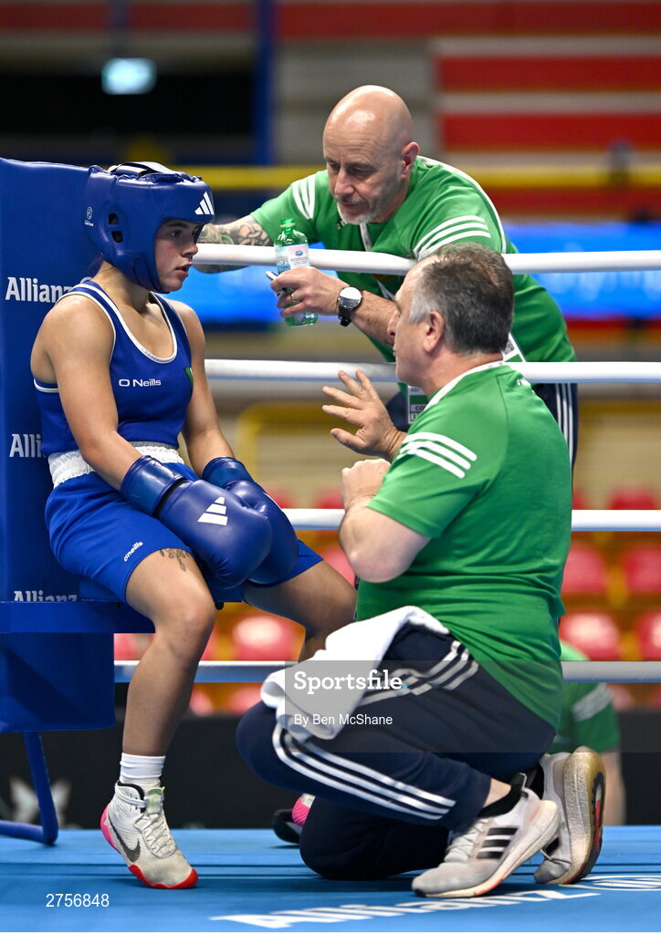 8 March 2024; Daina Moorehouse of Ireland receives instructions from her coaches Zaur Antia, right, and Damian Kennedy during her Women's 50kg Round of 32 bout against Tayonis Cedeno of Venezuela during day six at the Paris 2024 Olympic Boxing Qualification Tournament at E-Work Arena in Busto Arsizio, Italy. Photo by Ben McShane/Sportsfile