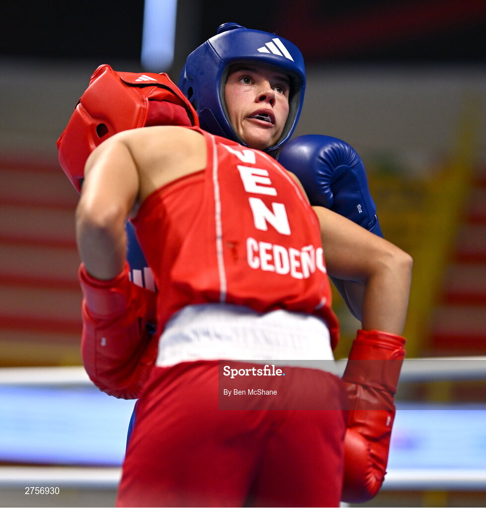 8 March 2024; Daina Moorehouse of Ireland, right, in action against Tayonis Cedeno of Venezuela during their Women's 50kg Round of 32 bout against during day six at the Paris 2024 Olympic Boxing Qualification Tournament at E-Work Arena in Busto Arsizio, Italy. Photo by Ben McShane/Sportsfile