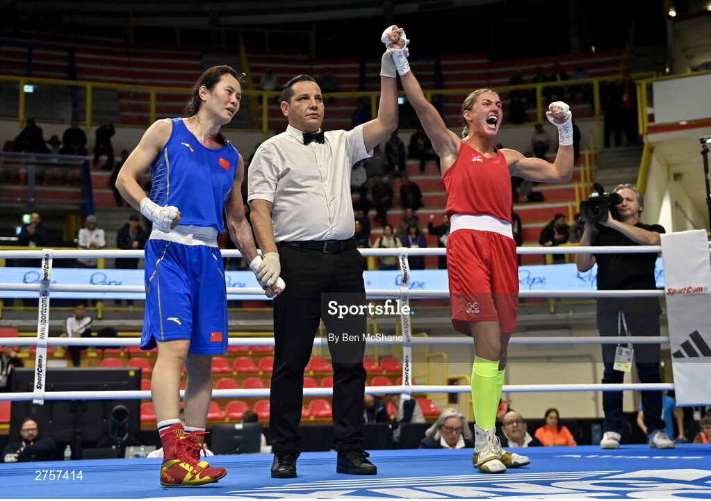 8 March 2024; Elise Glynn of Great Britain celebrates as she is declared victorious in their Women's 57kg Round of 32 bout against Zichun Xu of China during day six at the Paris 2024 Olympic Boxing Qualification Tournament at E-Work Arena in Busto Arsizio, Italy. Photo by Ben McShane/Sportsfile