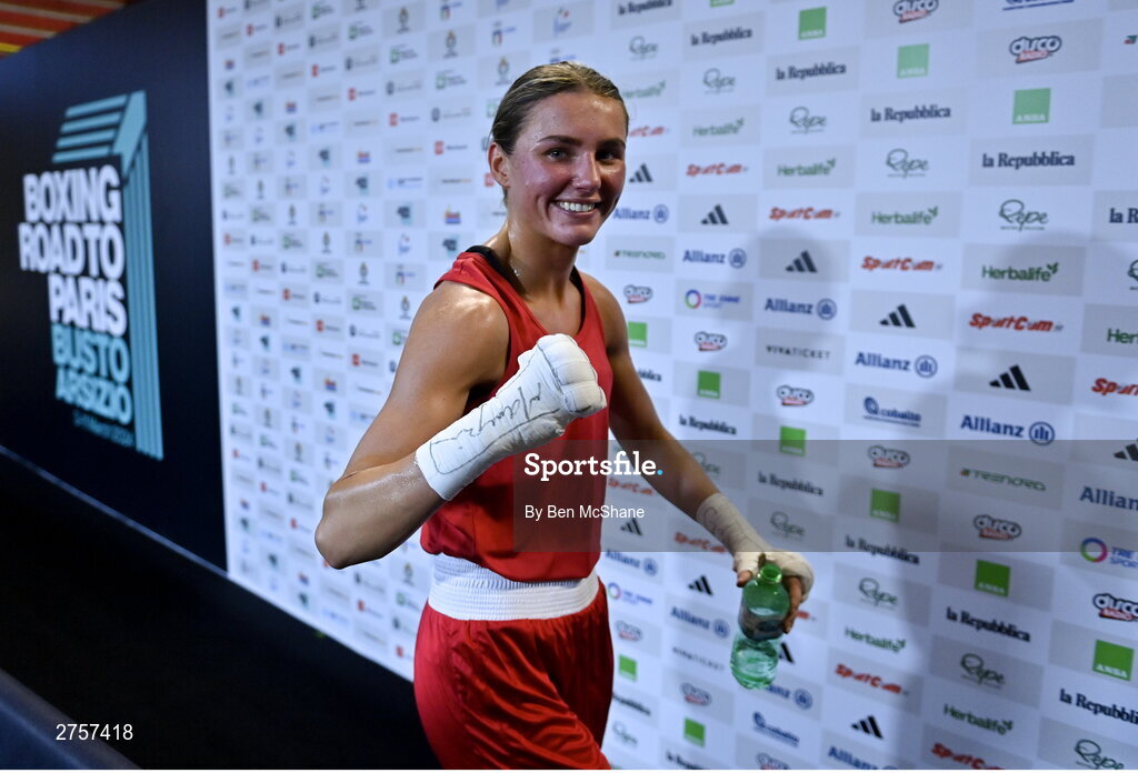 8 March 2024; Elise Glynn of Great Britain celebrates after her victory in their Women's 57kg Round of 32 bout against Zichun Xu of China during day six at the Paris 2024 Olympic Boxing Qualification Tournament at E-Work Arena in Busto Arsizio, Italy. Photo by Ben McShane/Sportsfile