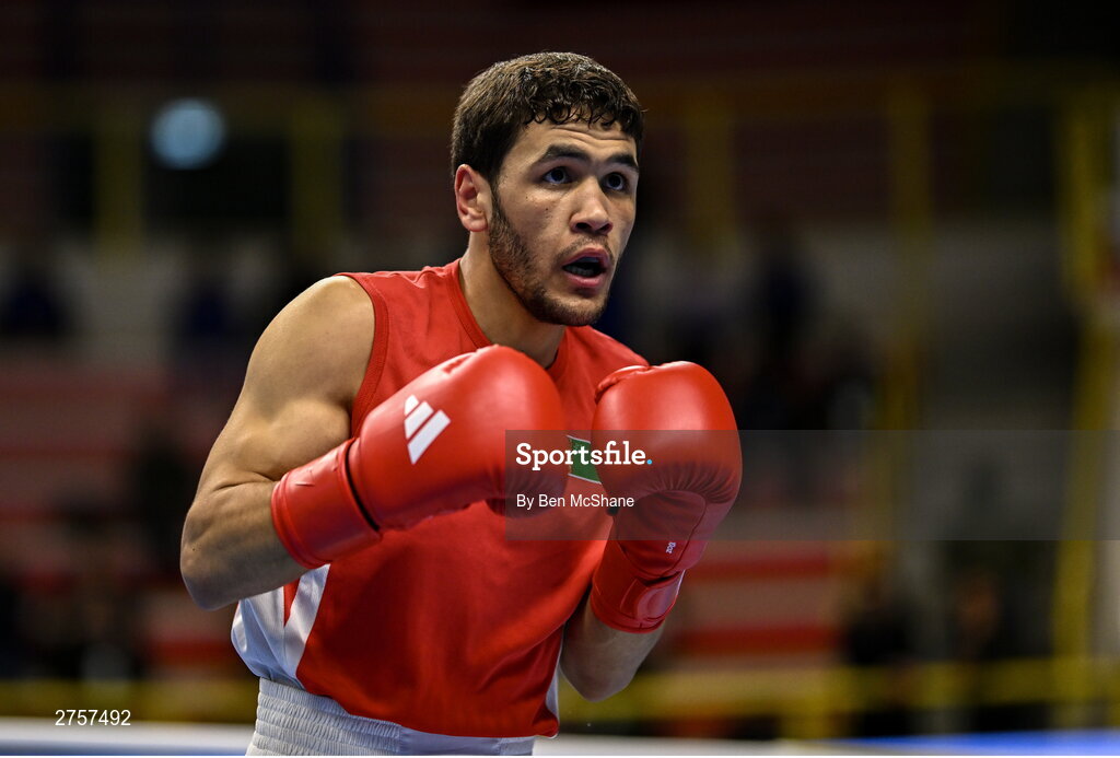 8 March 2024; Shakur Ovezov of Turkmenistan during their Men's 57kg Round of 32 bout against Daniyal Shahbakhsh of Iran during day six at the Paris 2024 Olympic Boxing Qualification Tournament at E-Work Arena in Busto Arsizio, Italy. Photo by Ben McShane/Sportsfile