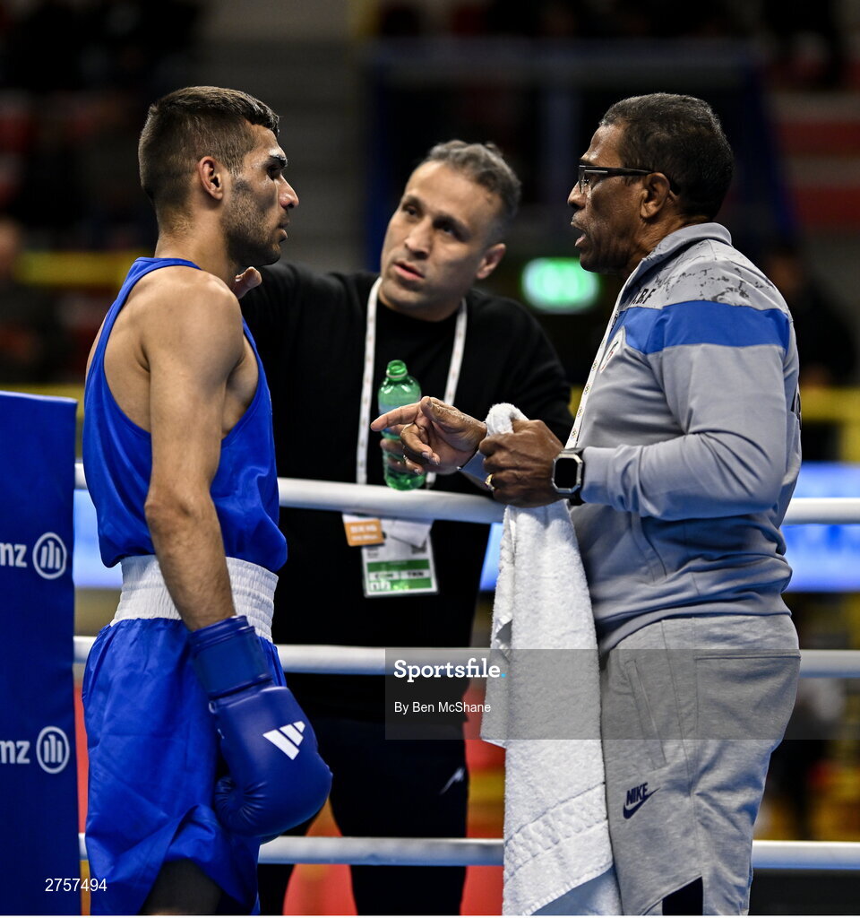 8 March 2024; Daniyal Shahbakhsh of Iran with Iran coaches Homayon Omiri, centre, and Juan Bautista Fontanills Quaseda during their Men's 57kg Round of 32 bout against Shakur Ovezov of Turkmenistan during day six at the Paris 2024 Olympic Boxing Qualification Tournament at E-Work Arena in Busto Arsizio, Italy. Photo by Ben McShane/Sportsfile