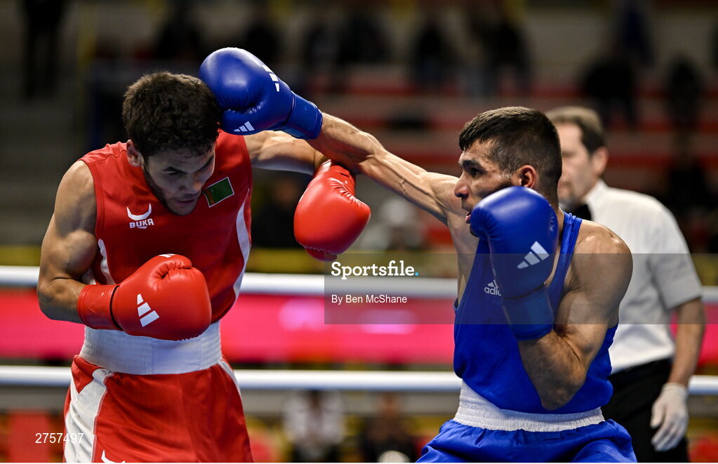 8 March 2024; Shakur Ovezov of Turkmenistan, left, in action against Daniyal Shahbakhsh of Iran during their Men's 57kg Round of 32 bout during day six at the Paris 2024 Olympic Boxing Qualification Tournament at E-Work Arena in Busto Arsizio, Italy. Photo by Ben McShane/Sportsfile