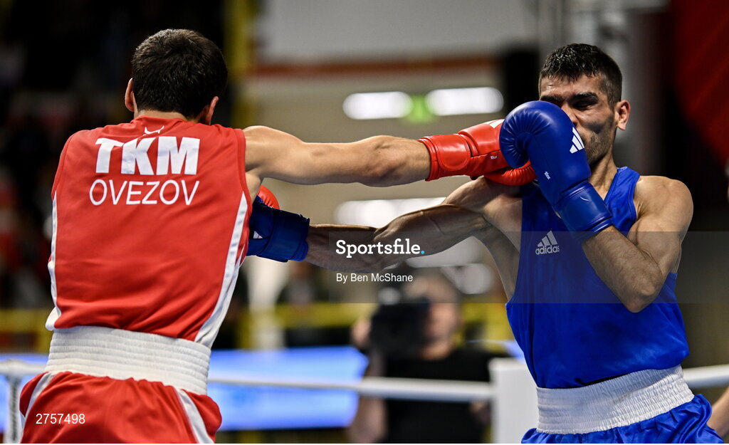 8 March 2024; Shakur Ovezov of Turkmenistan, left, in action against Daniyal Shahbakhsh of Iran during their Men's 57kg Round of 32 bout during day six at the Paris 2024 Olympic Boxing Qualification Tournament at E-Work Arena in Busto Arsizio, Italy. Photo by Ben McShane/Sportsfile